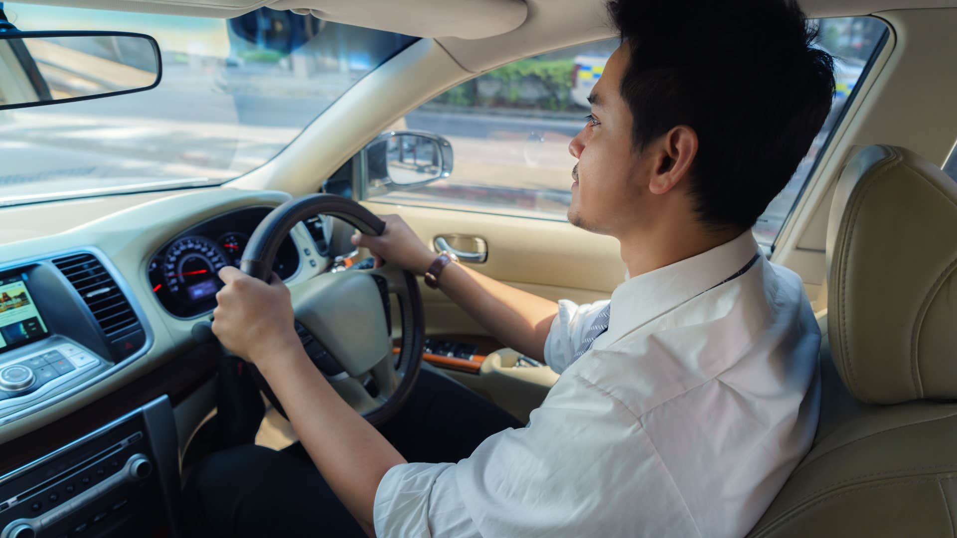 people who put their arm out to protect their passengers while driving usually have these specific personality traits they need to be in control 