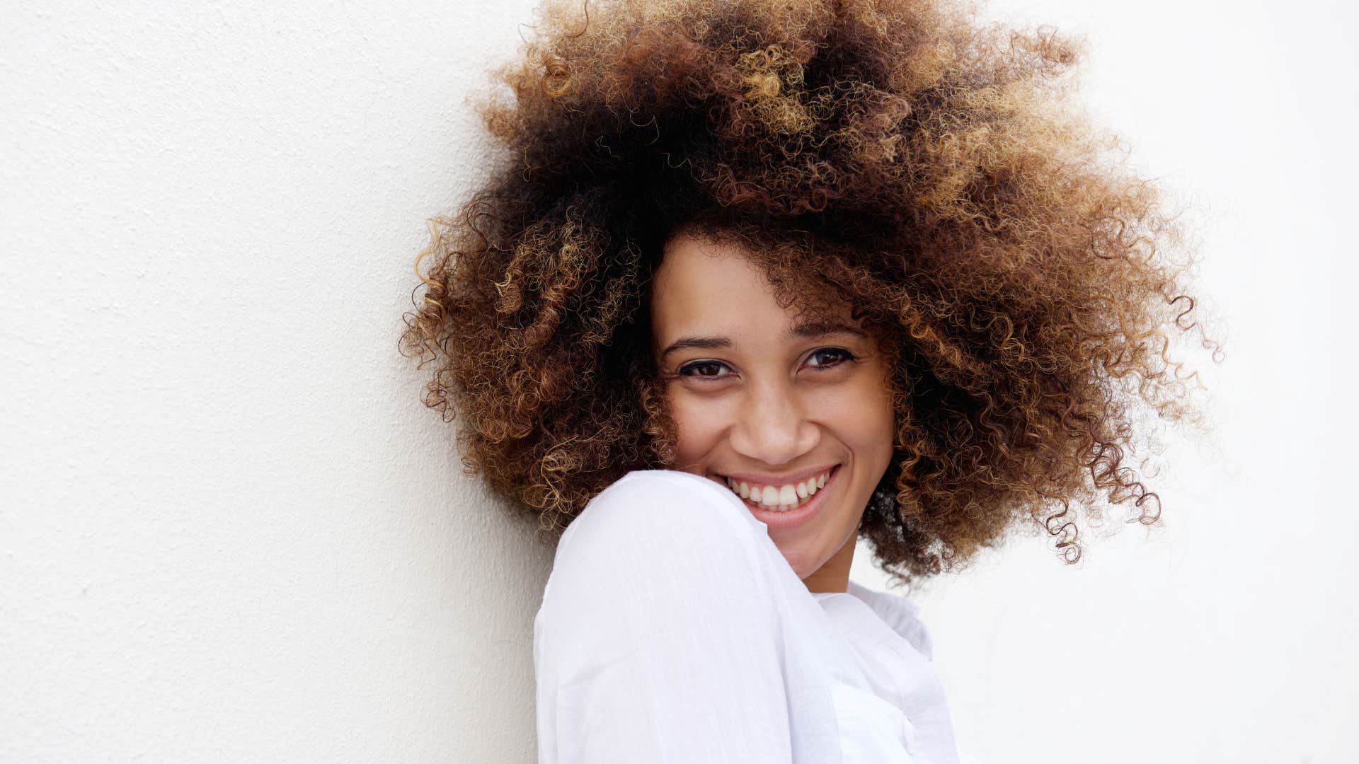 optimistic woman who saves containers she might need one day