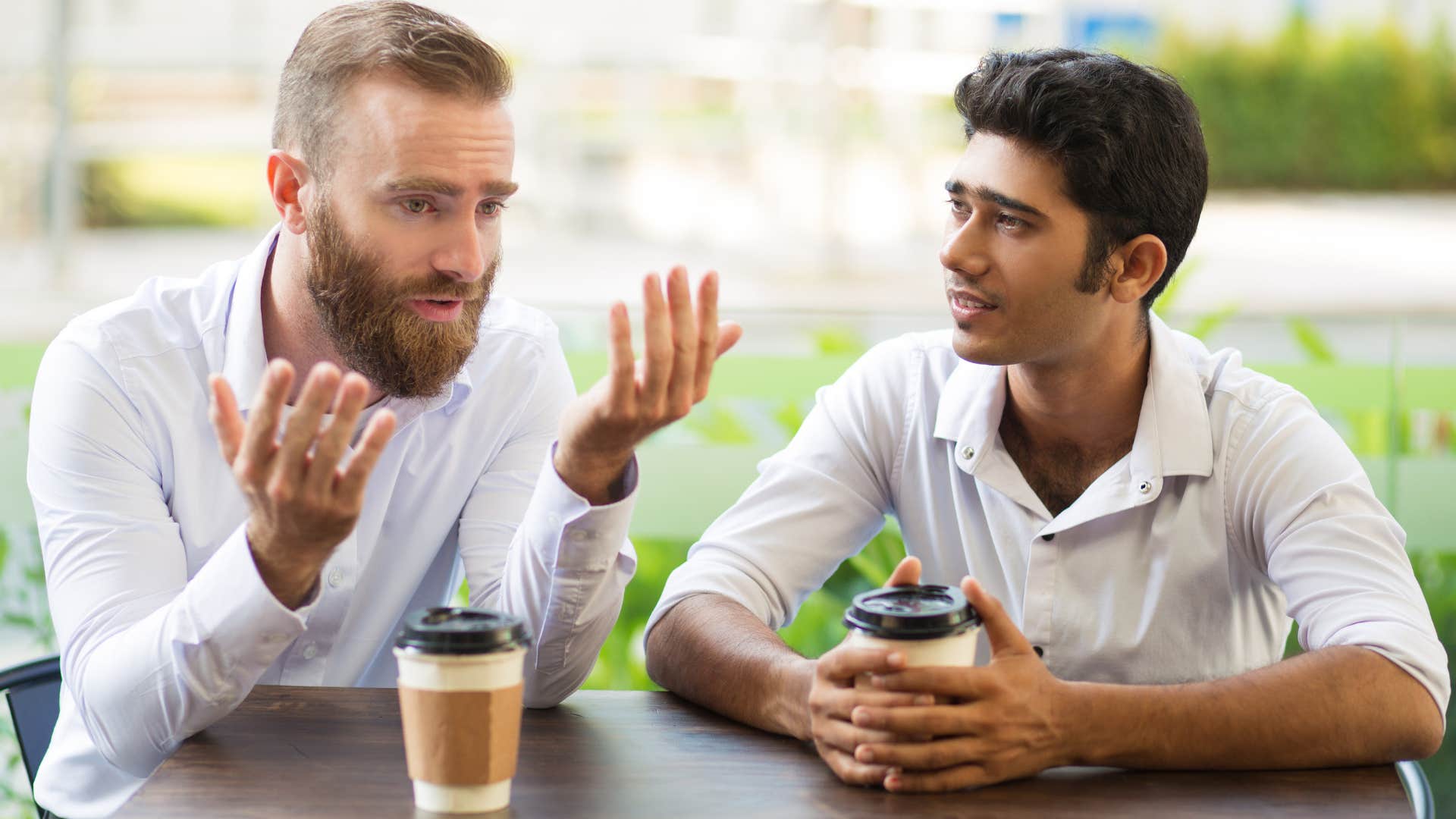 arrogant man saying I was right to his annoyed friend