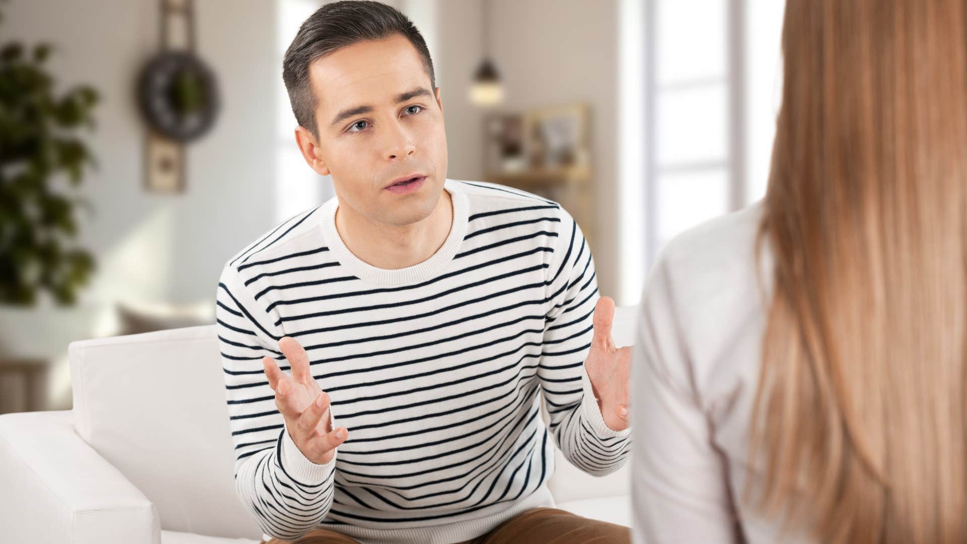 Man saying "How could you do that to me?" to his friend.