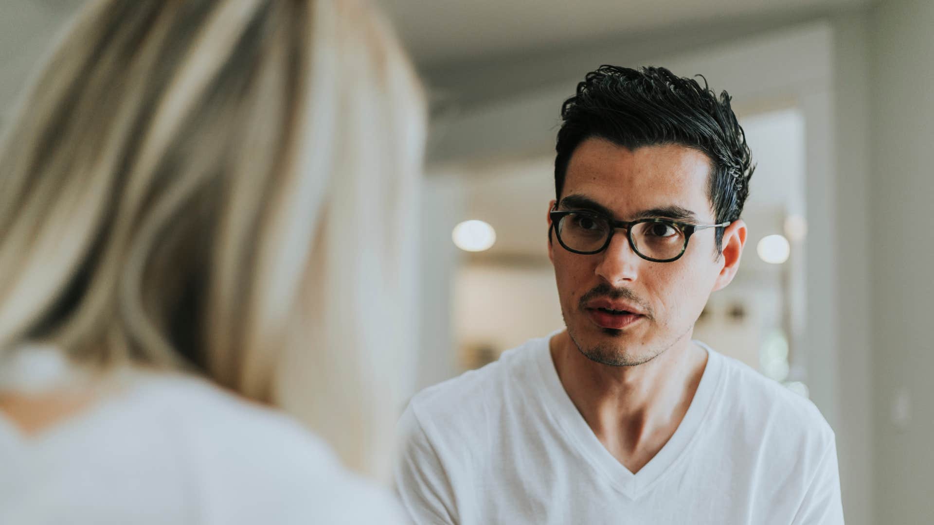 rude man telling woman you should've known better