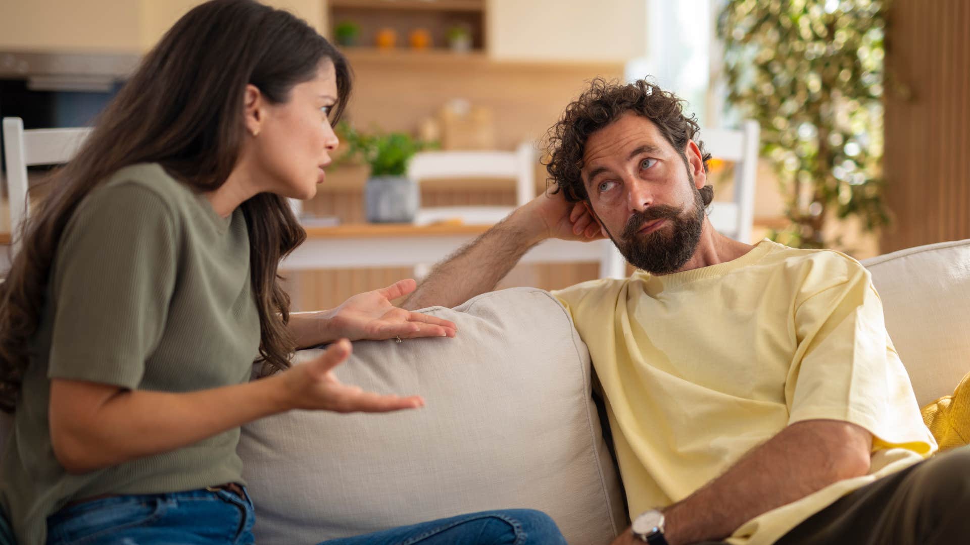 rude man saying you're oversimplifying things to his irritated partner