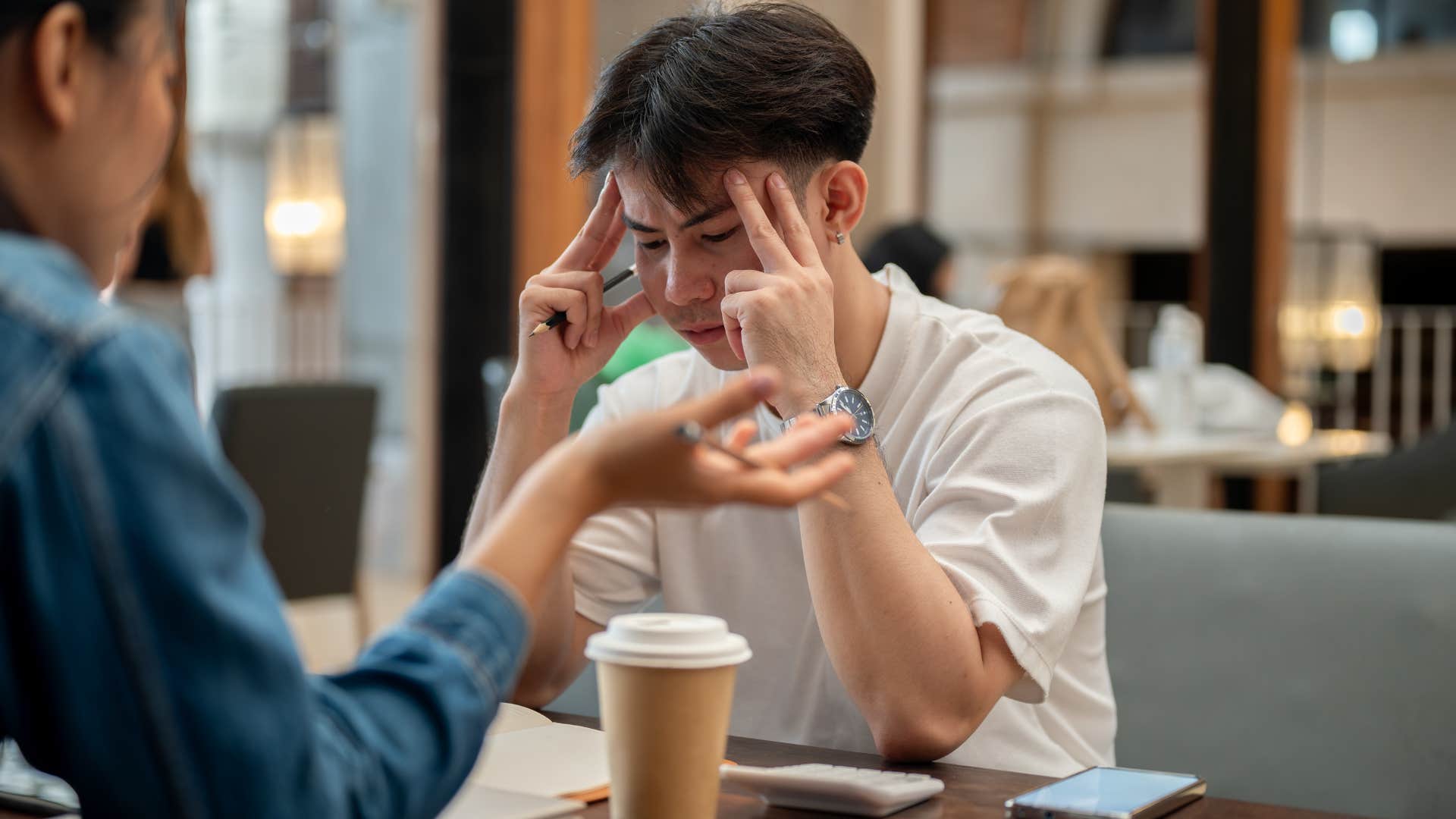 man who's upset because his friend told him she can't believe how confident he is