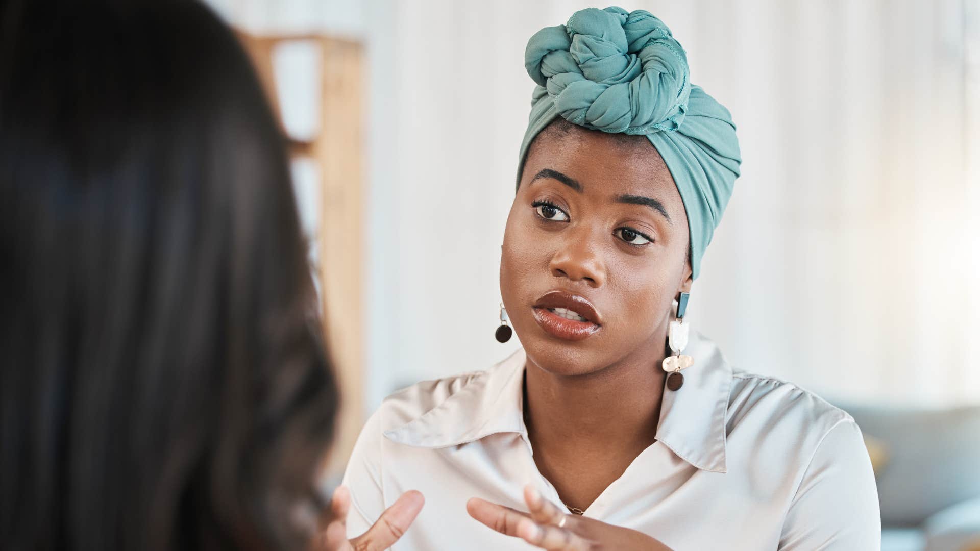 woman talking to friend 