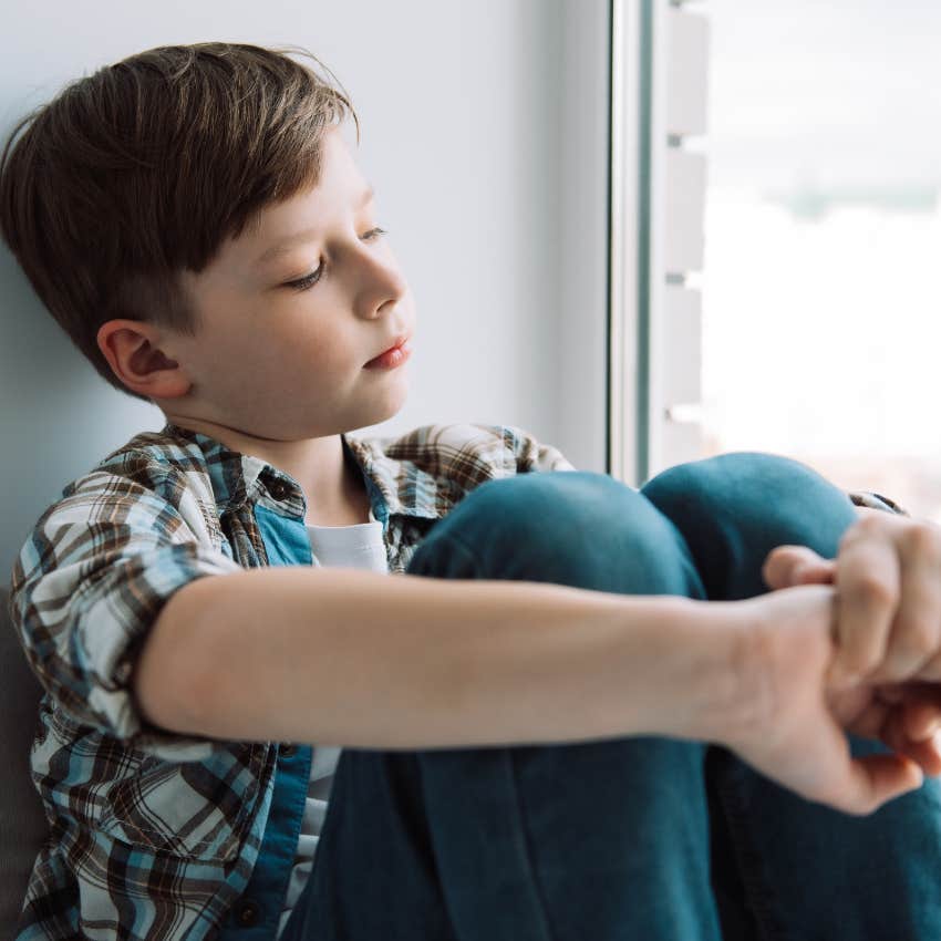 Little boy practicing the art of waiting at home