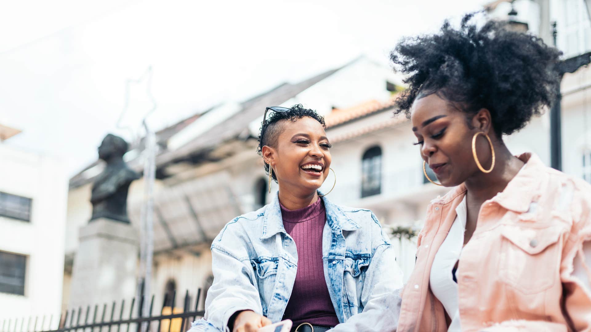 two women talking outside respecting each other's opinions