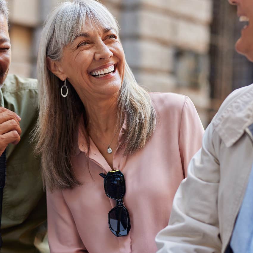 Woman saying "please" and "thank you" to her friends.