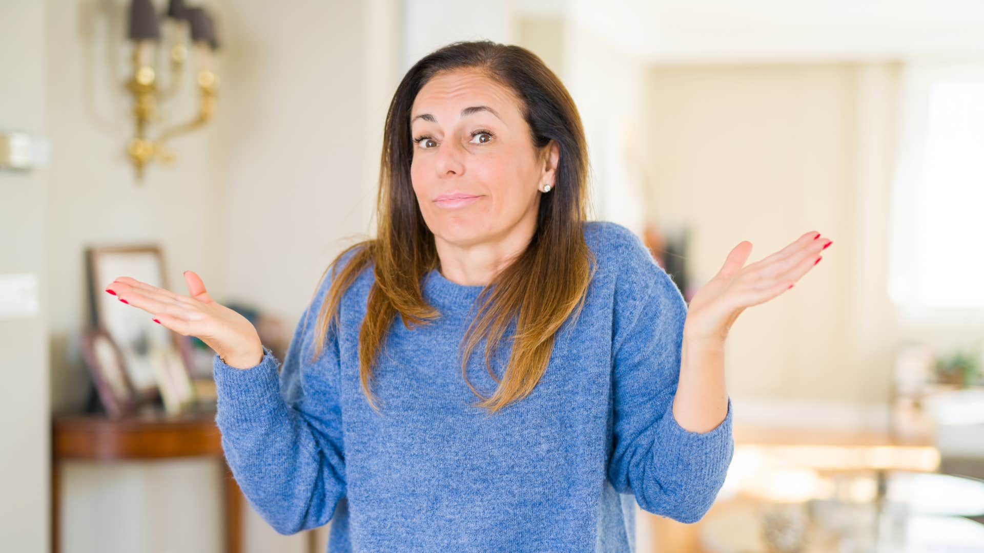 woman shrugging saying what's the worst that could happen