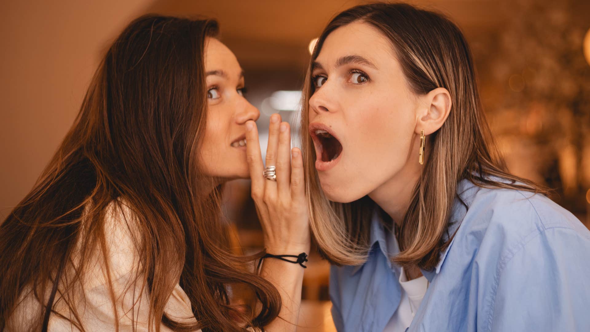 Woman saying did you hear about what they did to her friend