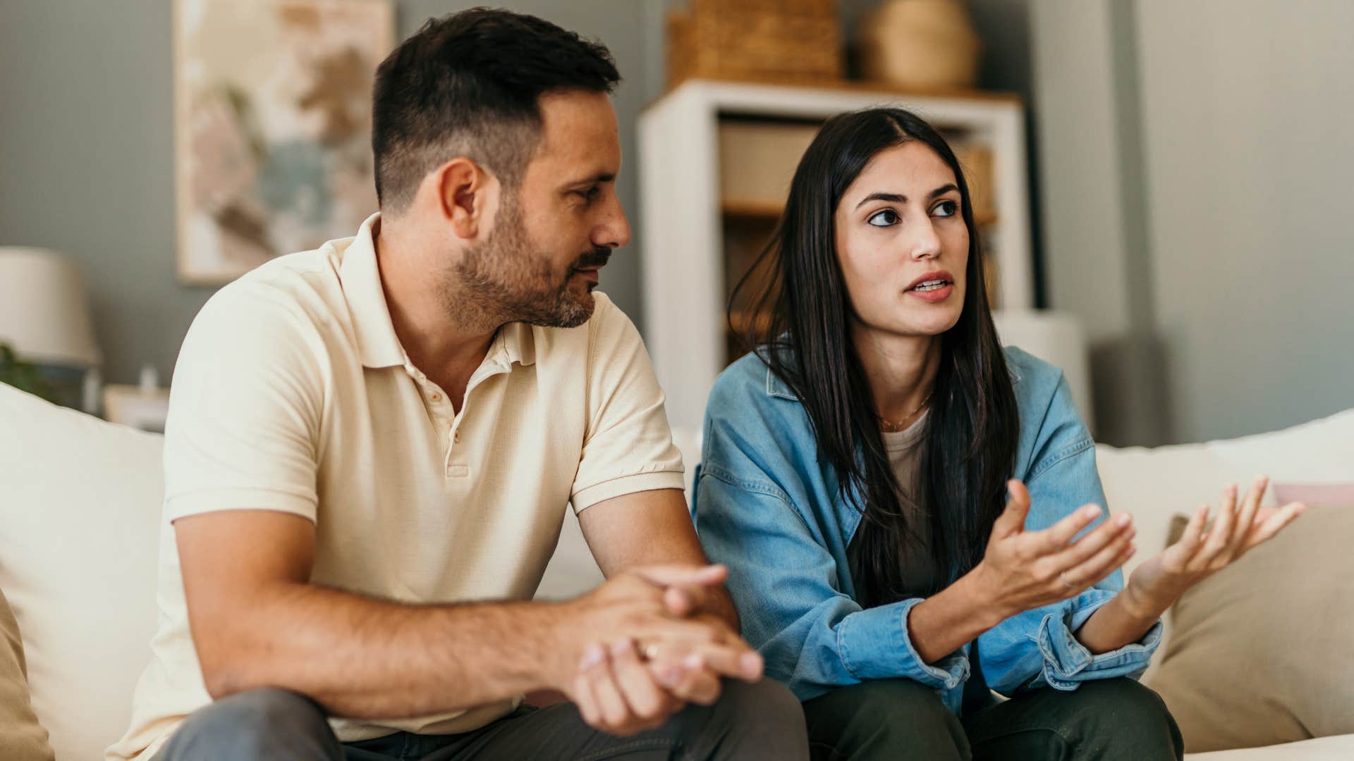 Woman saying it's not her fault to her partner