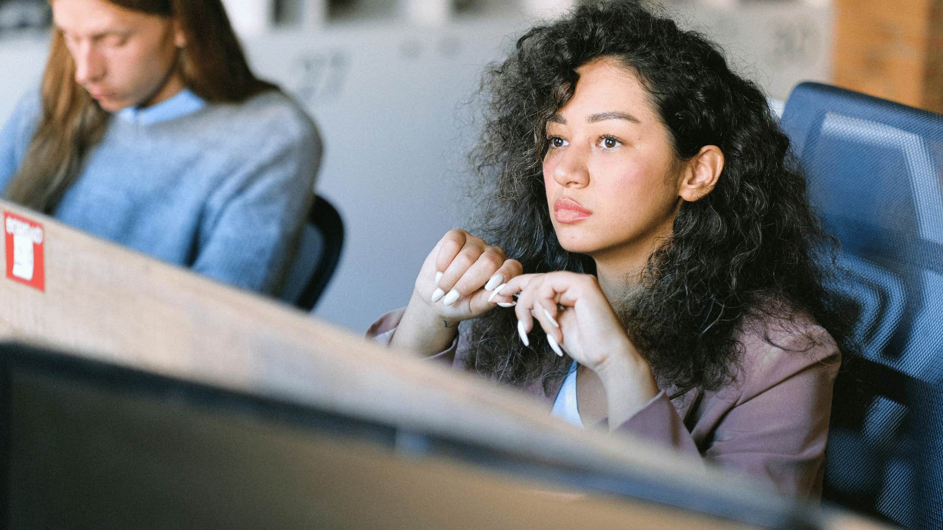professional young woman thinking about her life's purpose