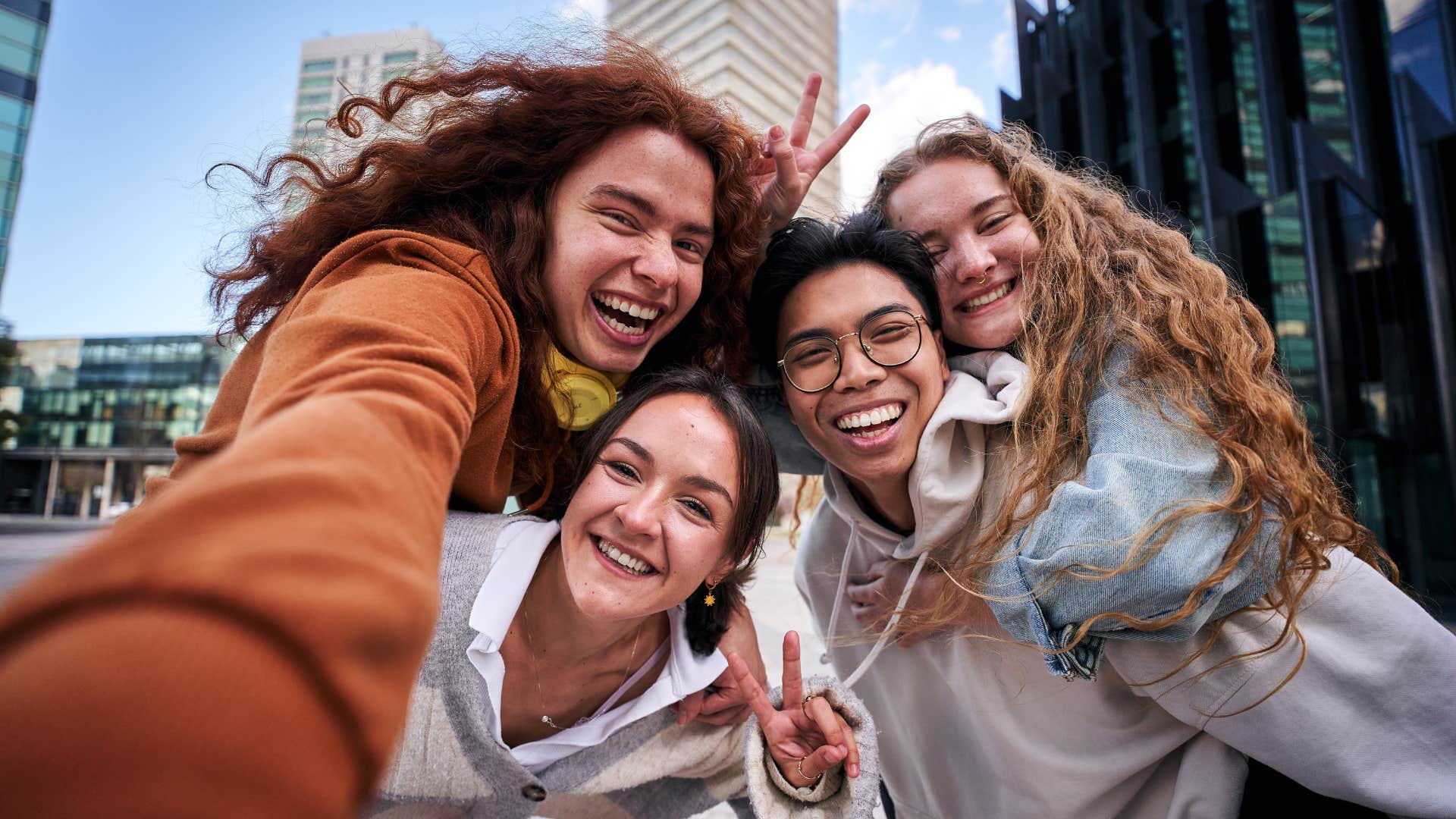 Happy friends on adventure showing admirable perspective