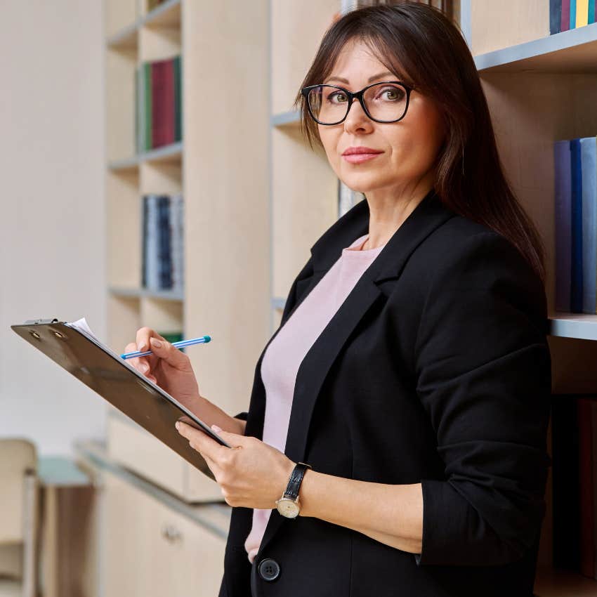 woman who's misunderstood more than underestimated standing at work