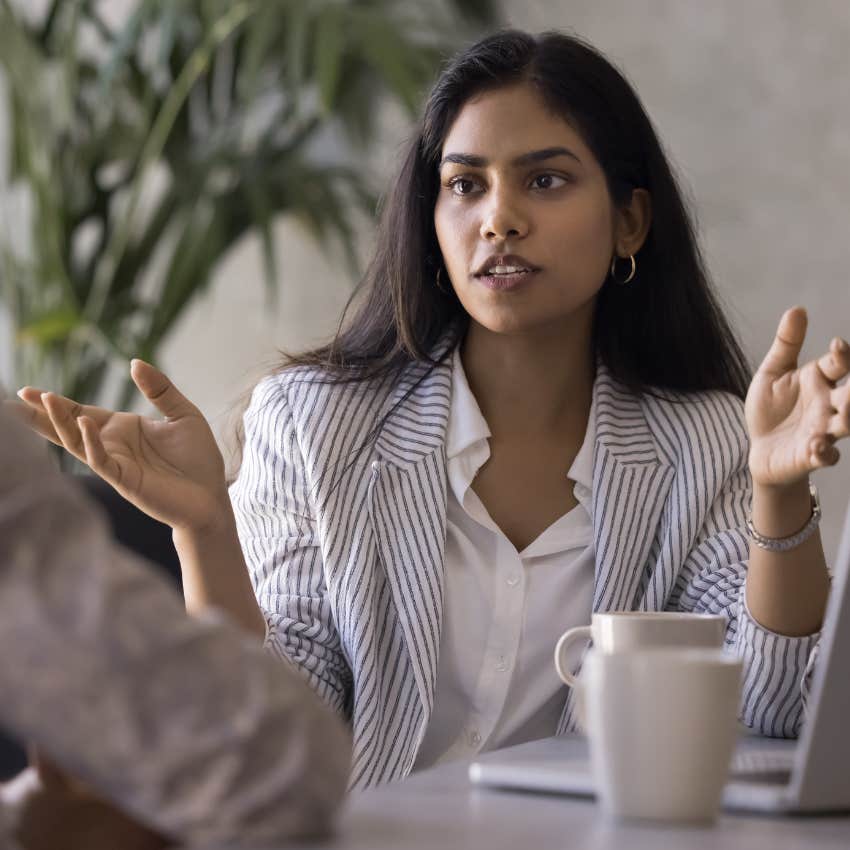 woman mirroring the energy of a colleague she deeply fears