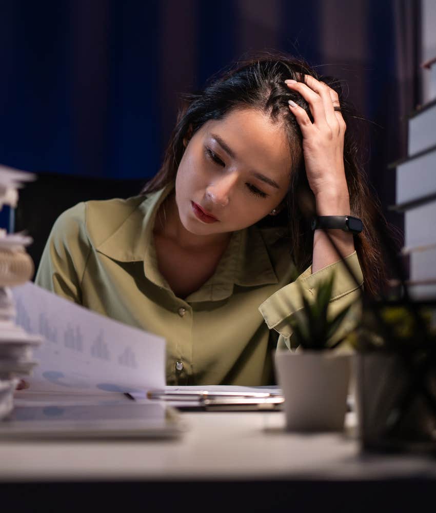 Anxious person struggle with too much paperwork 