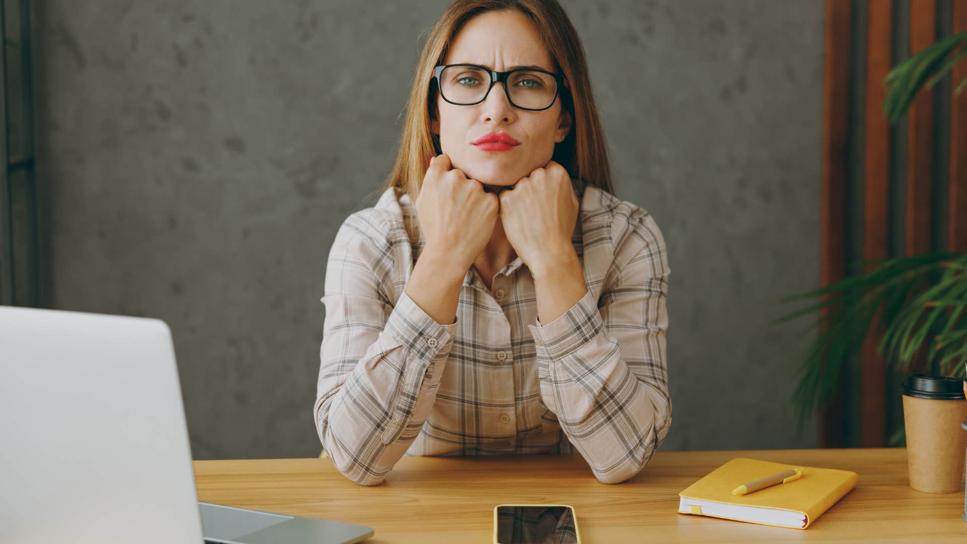 Frustrated person can't perform at work showing burnout