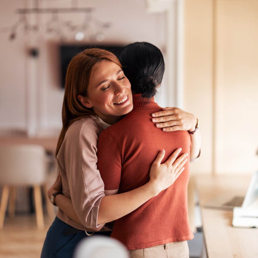 woman hugging kind friend