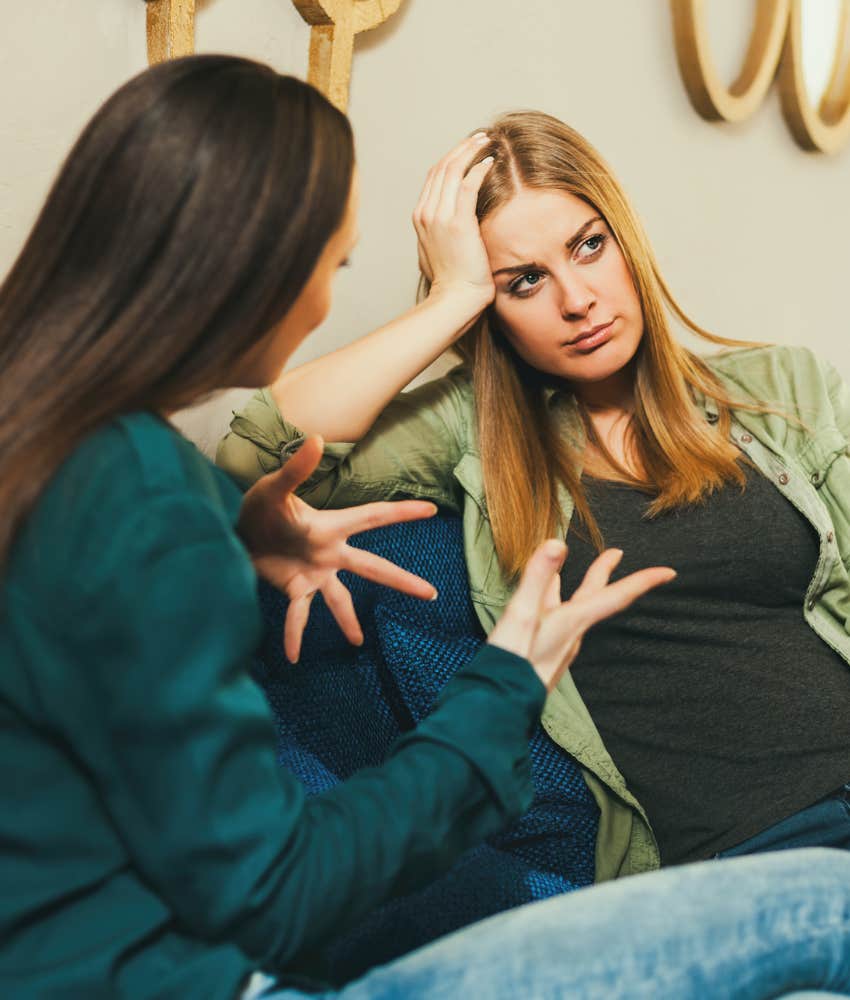 Hesitant person won't look at friend showing something is off
