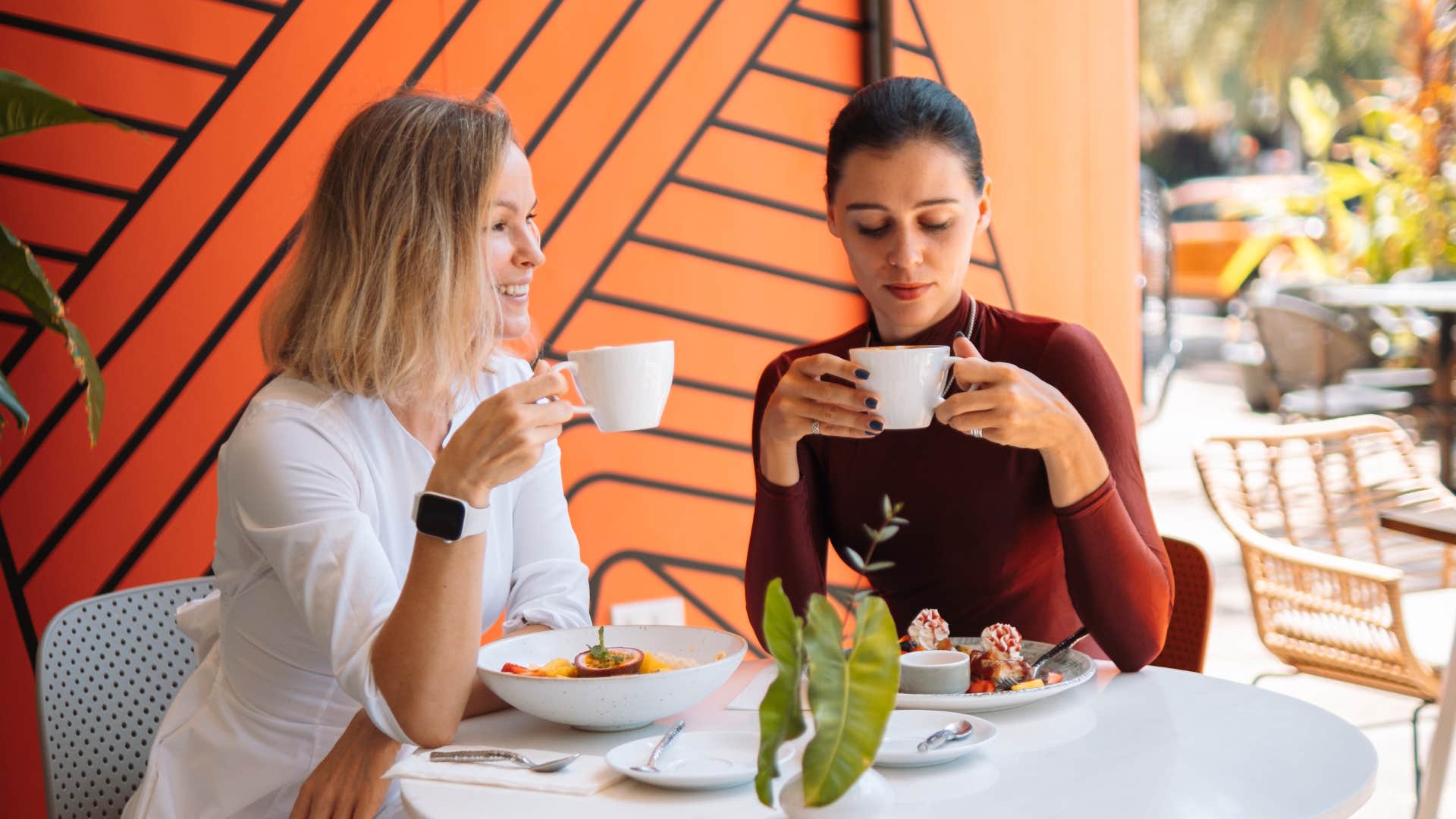 two friends having lunch together