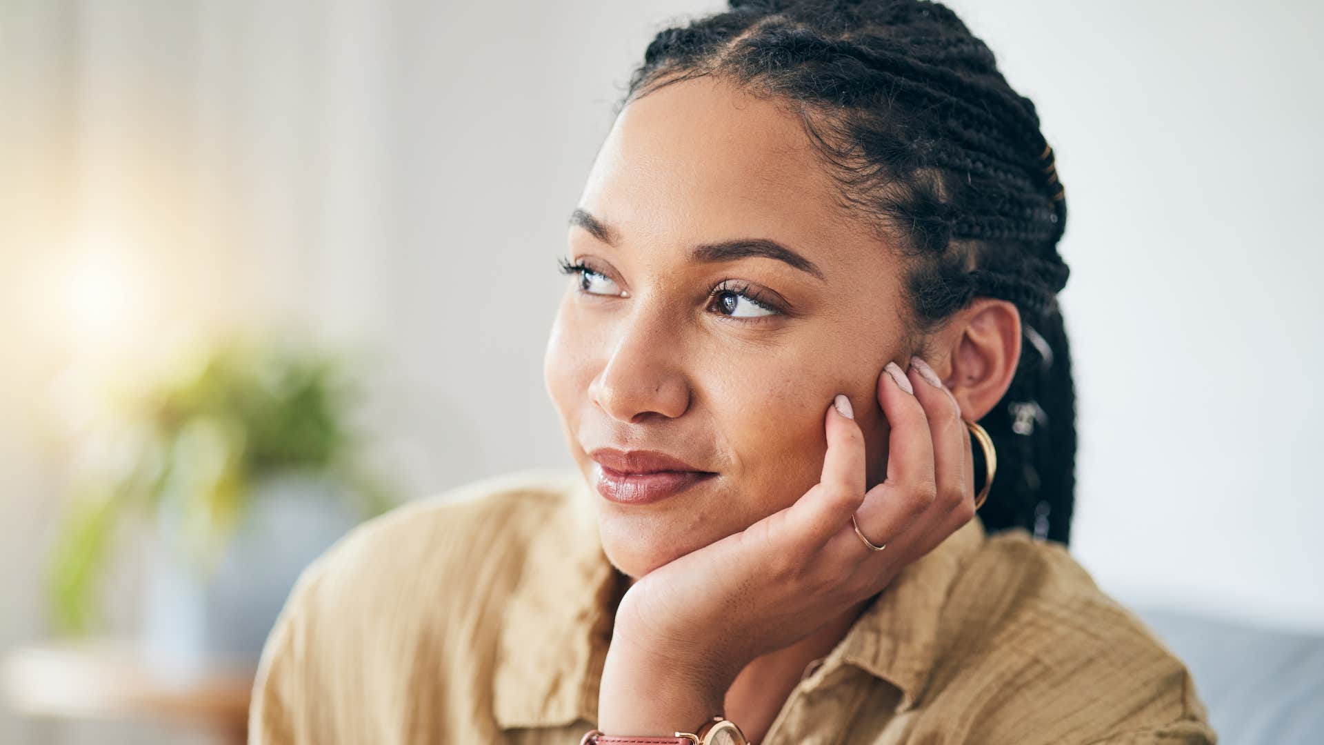 lonely woman trying to think positive and smiling
