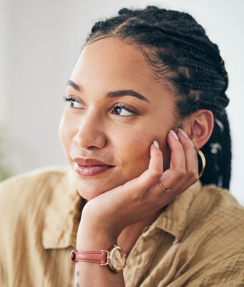 Happy person thinks about beliefs 