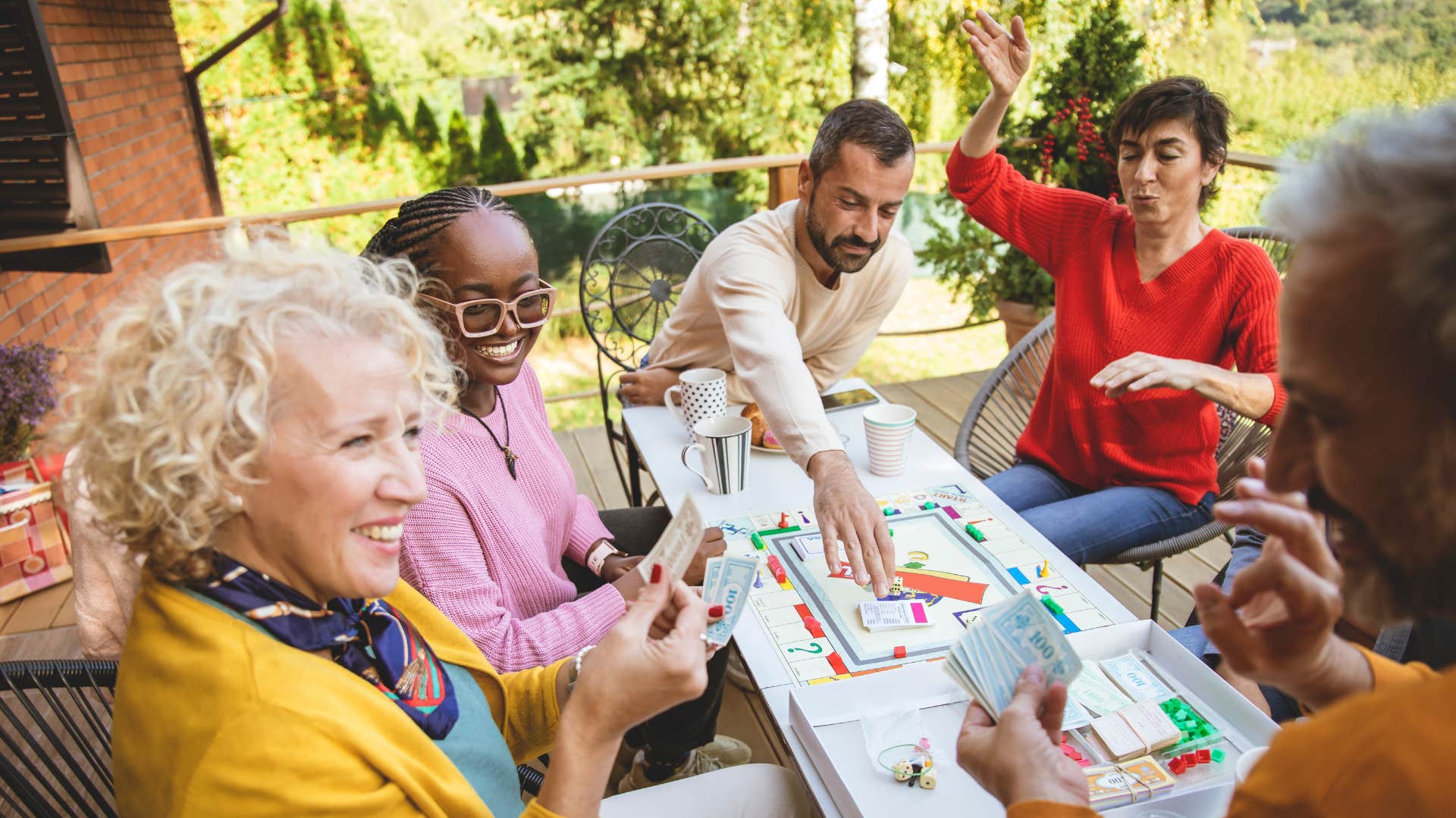 Excited friends play game showing other help you feel better