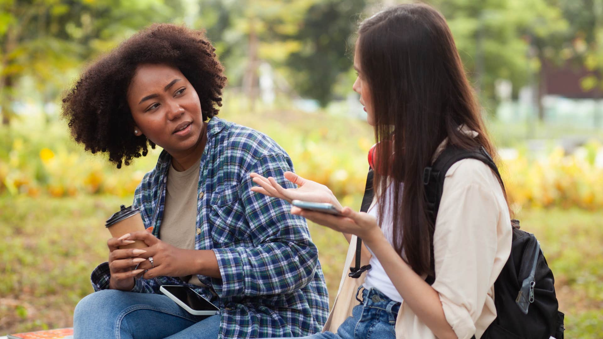 Shocked person can't believe the story showing friend filling space