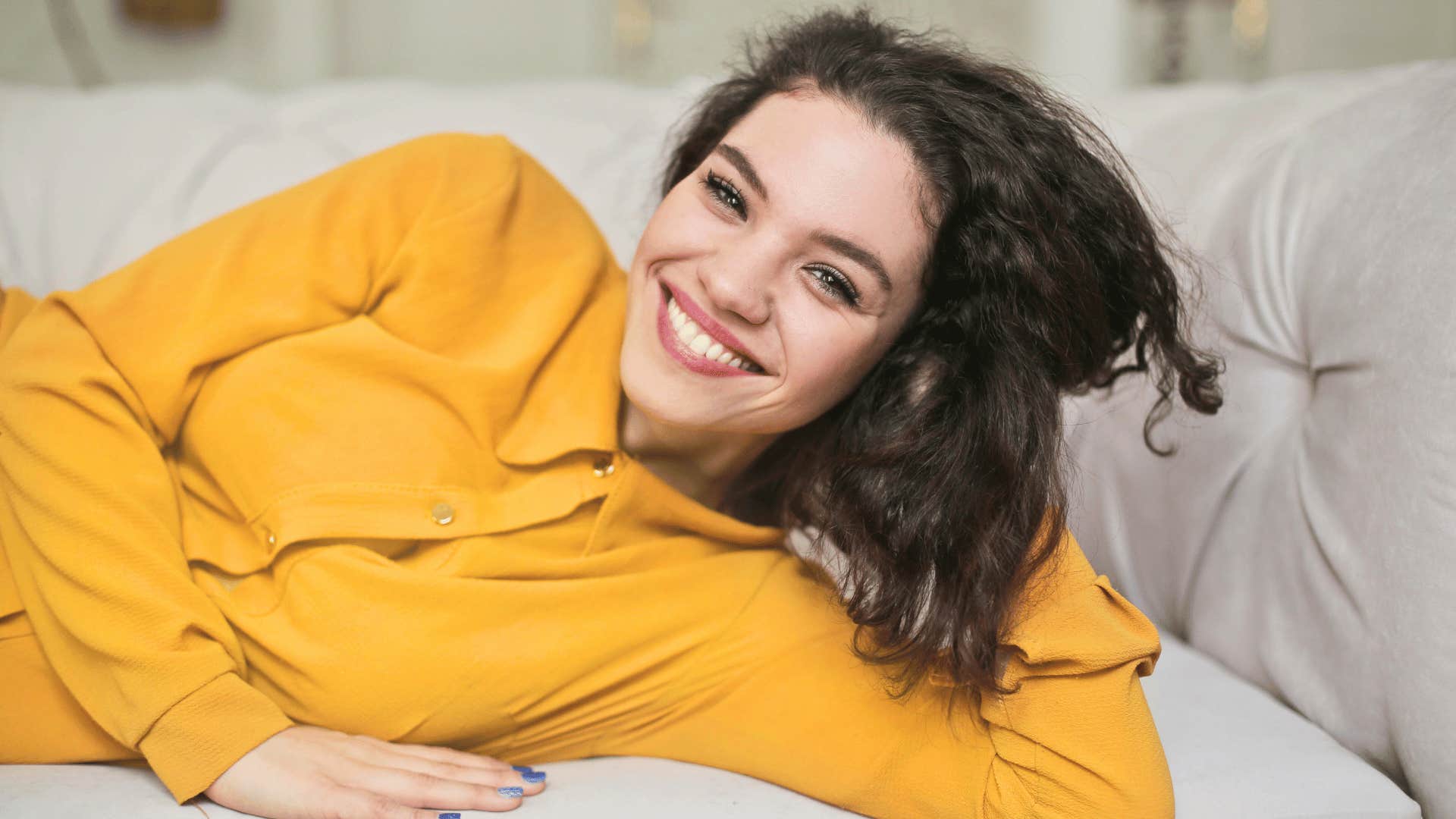 smiling young woman being less stressed out