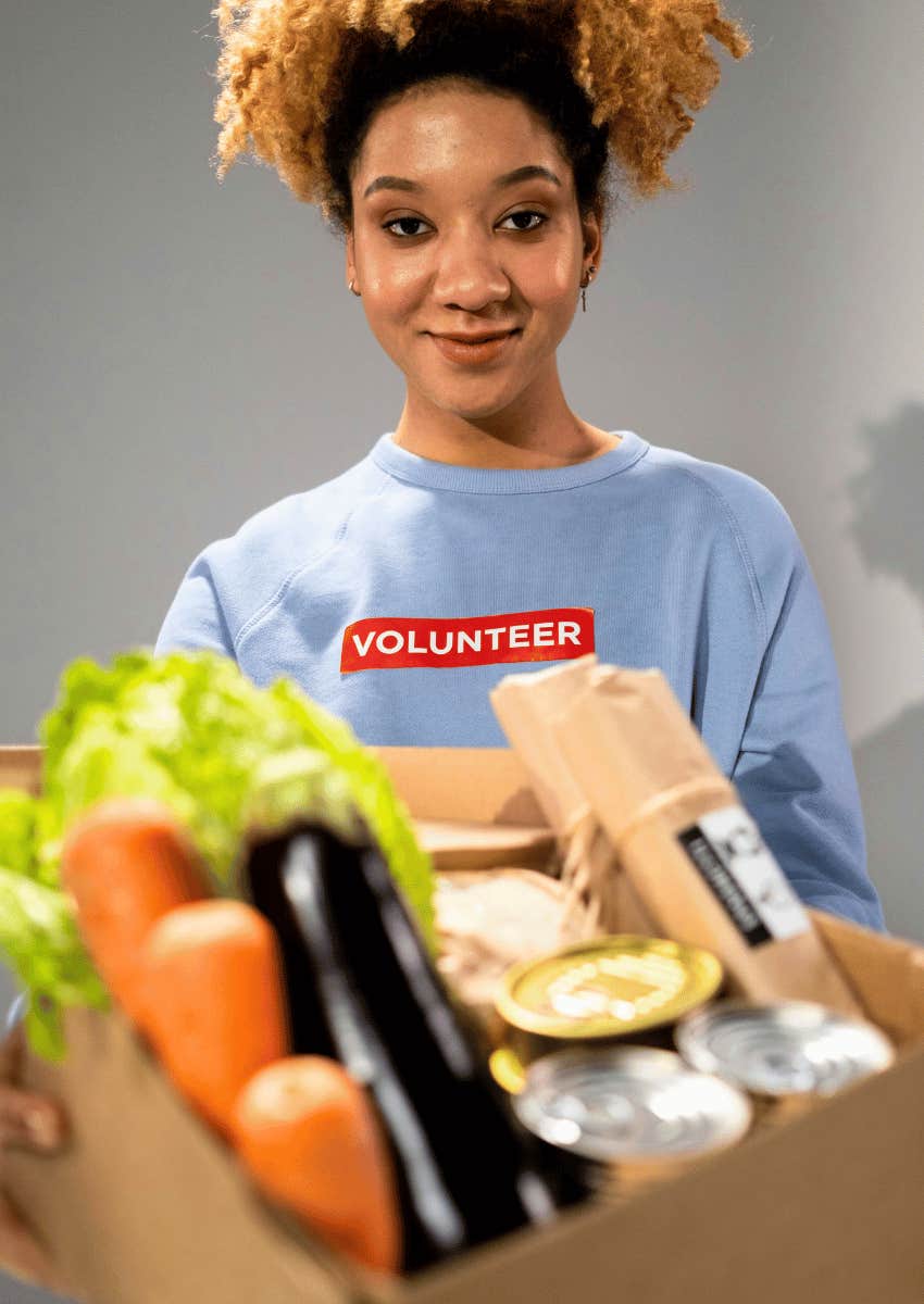 smiling young woman volunteering