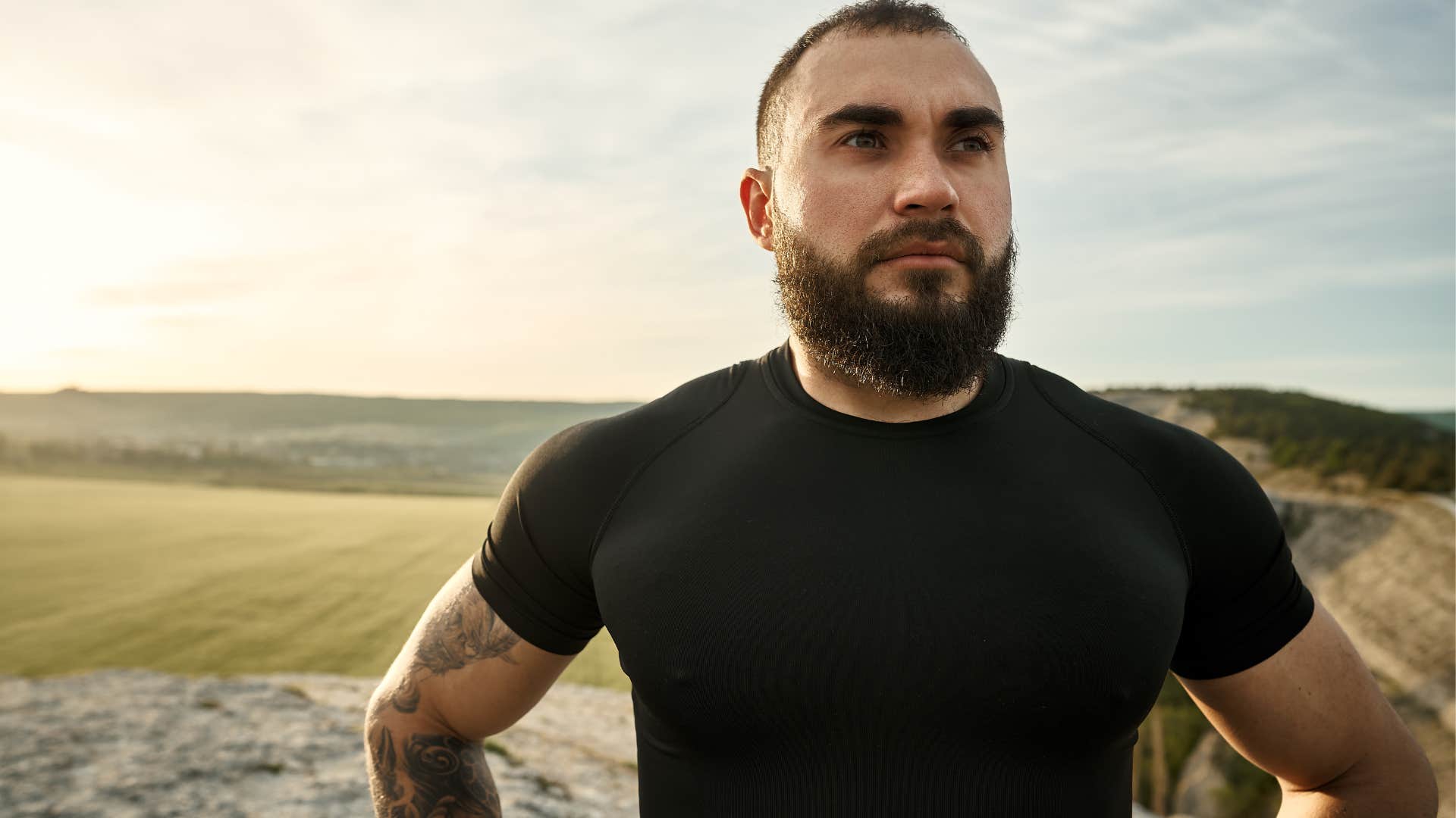 conscientious man walking outside away from crowds