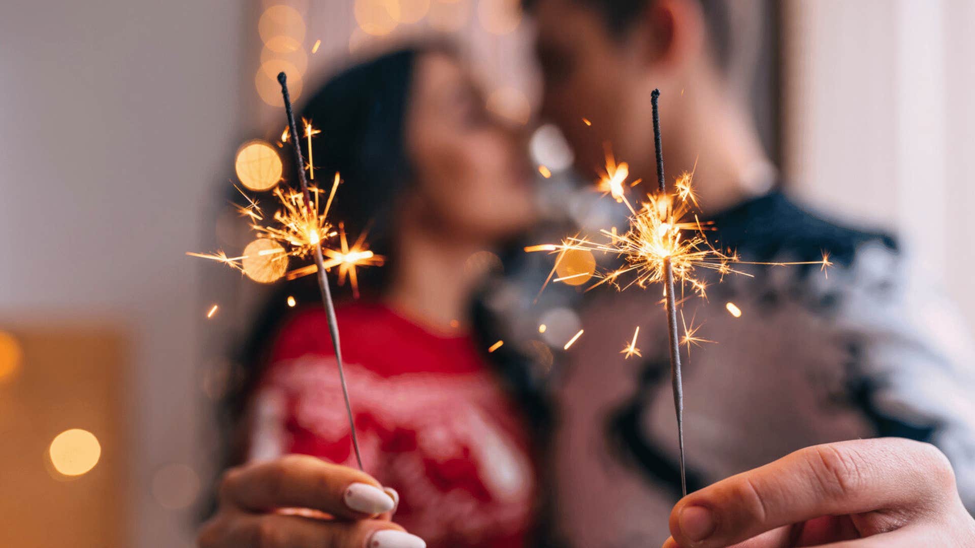 superstitious people share new year's kiss