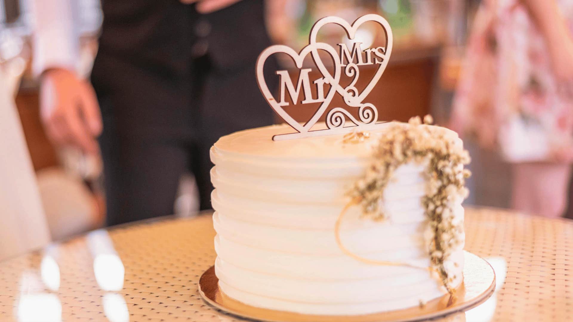 superstitious people using wedding cake to manifest their wedding