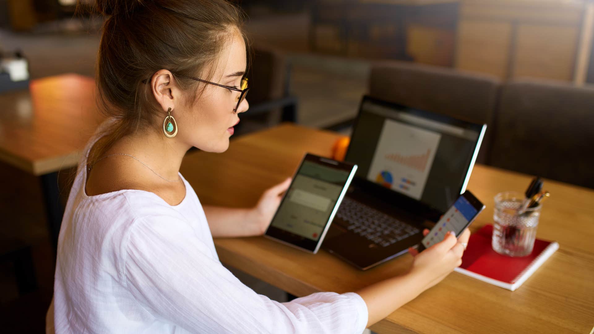 woman multitasking on multiple devices
