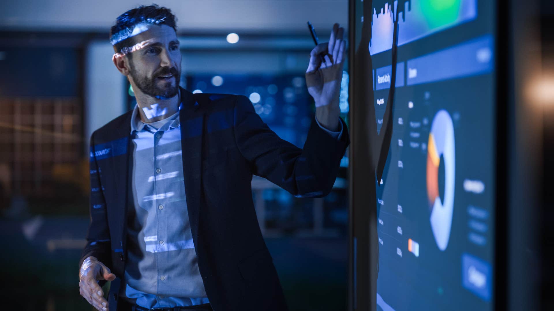 man making a presentation at work getting credit for something he didn't do