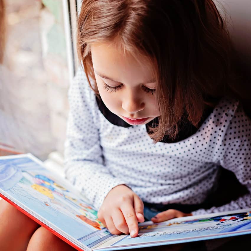 little girl reading experiencing boredom without guilt