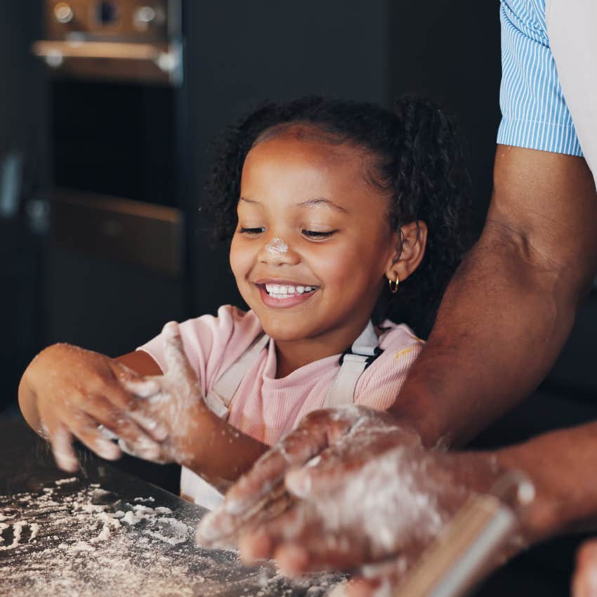 little girl feeling like time's passing slowly while baking with her parents
