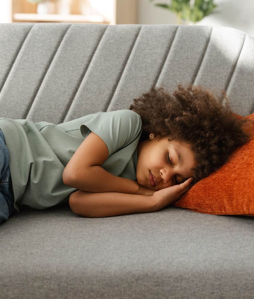 child sleeps on couch showing no big deal