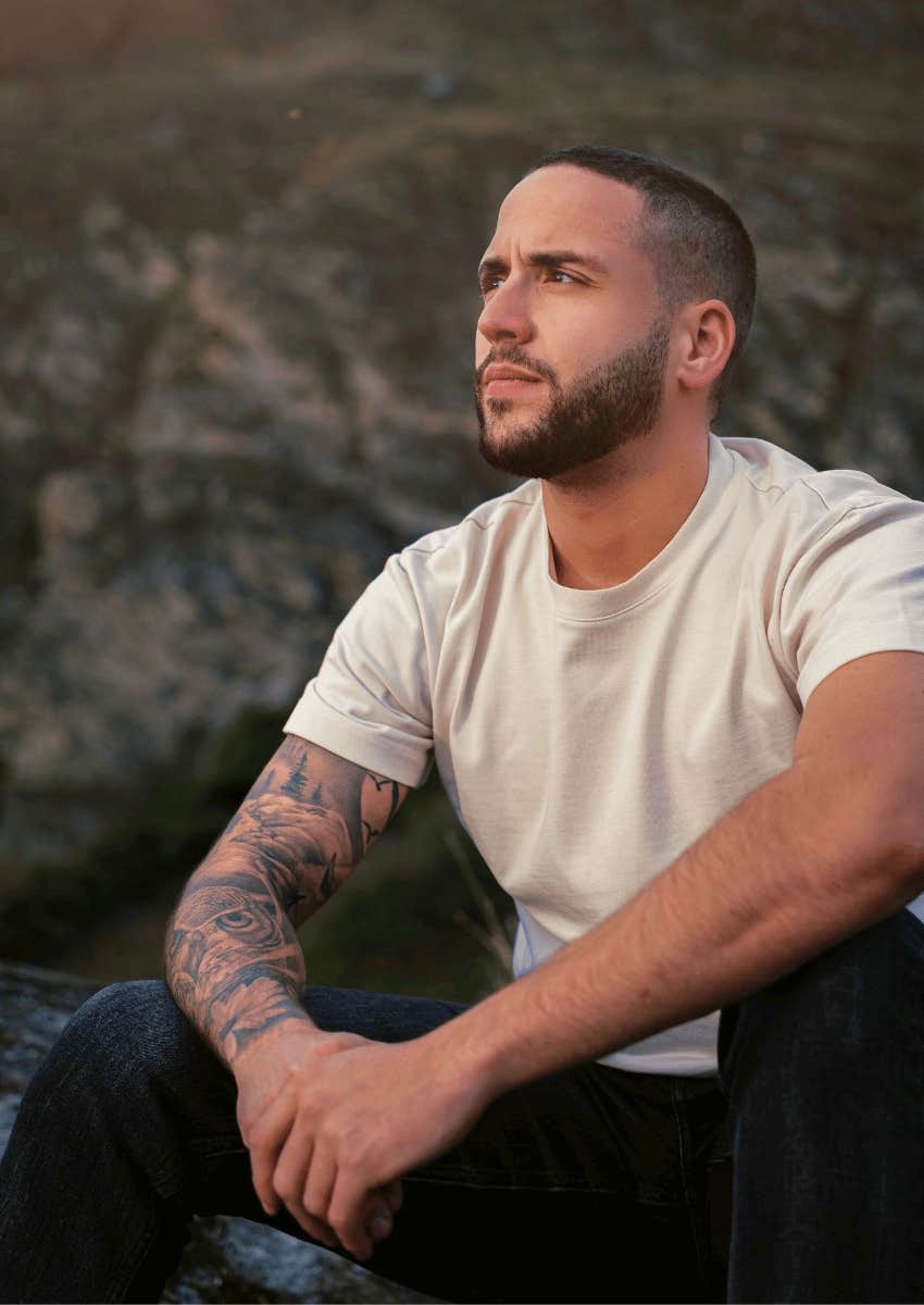 thoughtful young man accepting his emotions