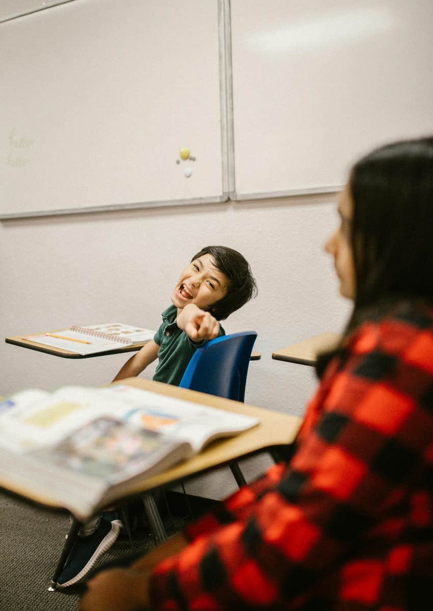 boy bullying a girl at school