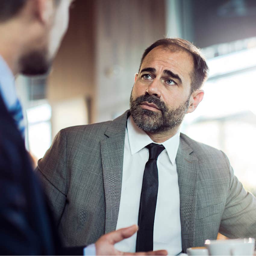 man telling colleague I can do whatever I want