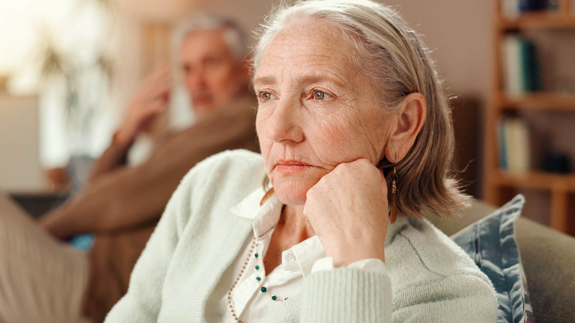 Woman who's not asking thoughtful questions sitting at home.