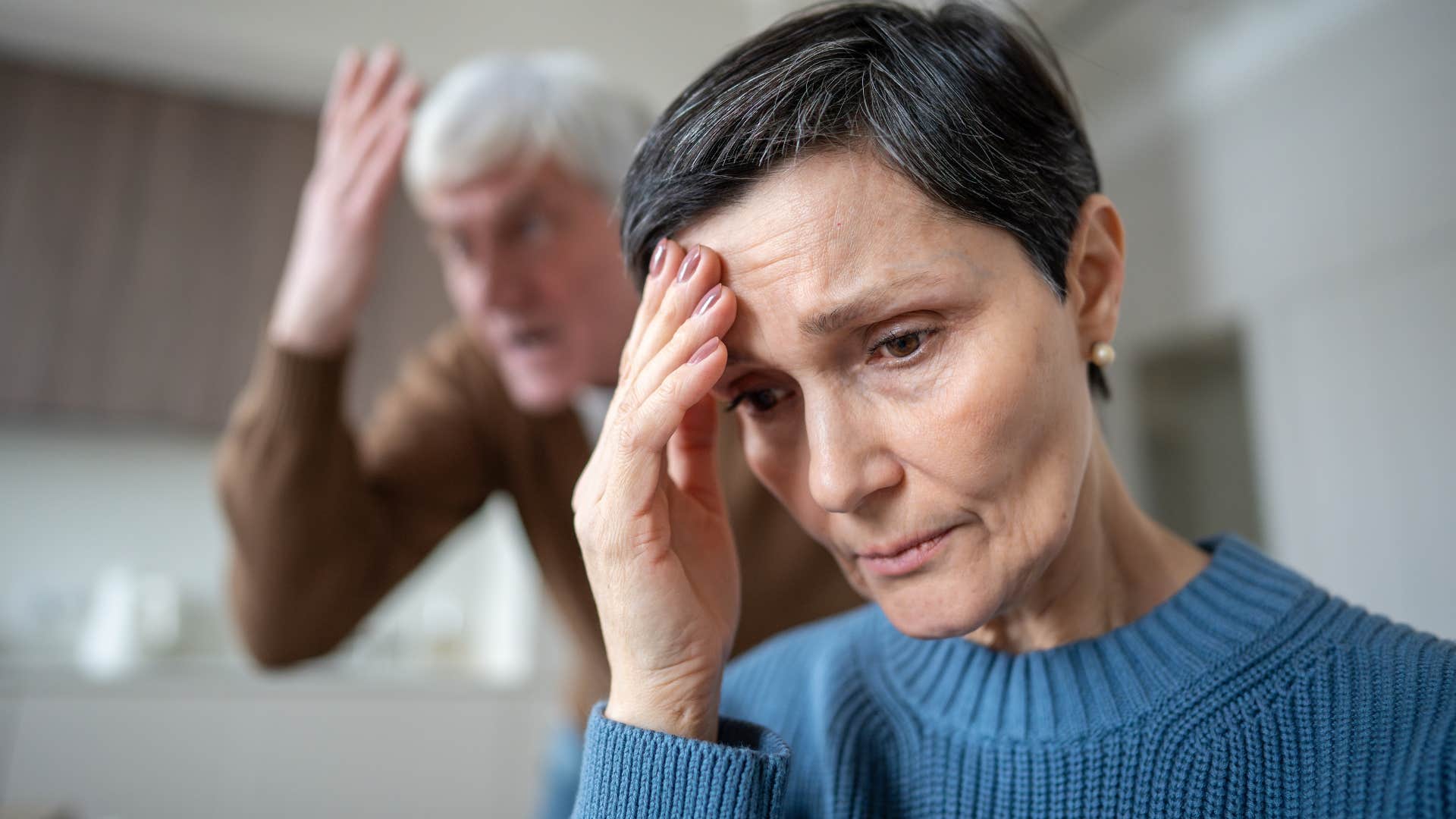 Woman struggling to express emotions honestly at home.