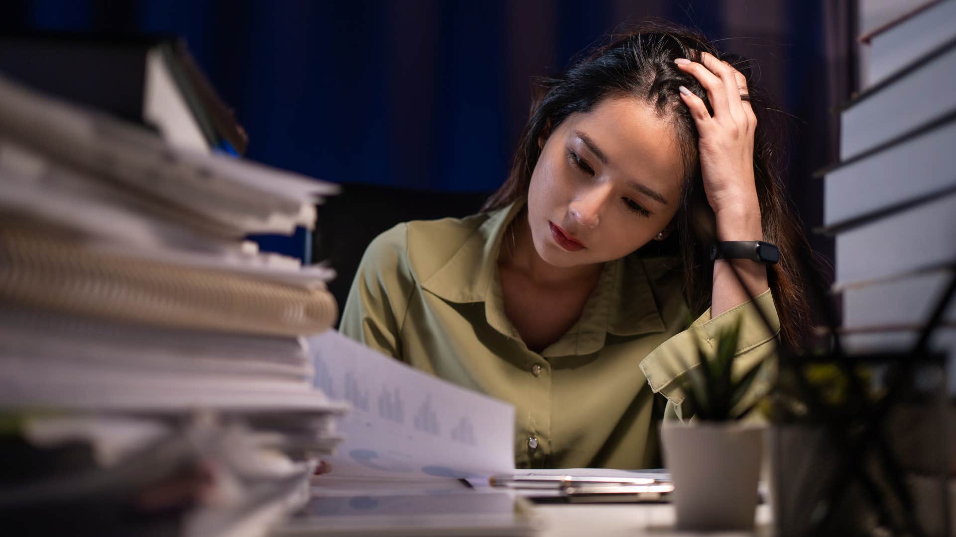Woman who's not going to bed at the same time as her partner.