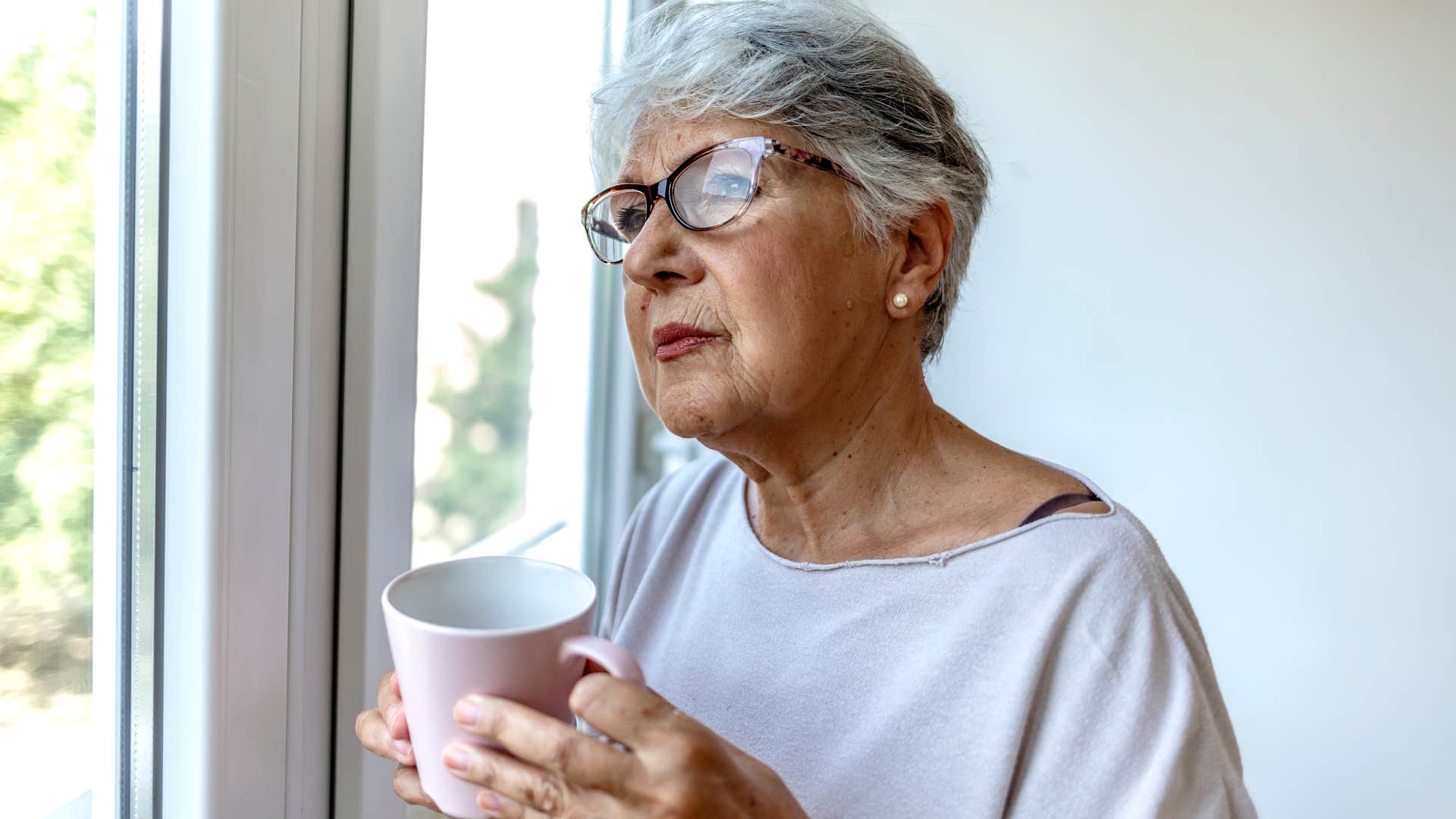 Woman who's not sharing routines together standing at home.