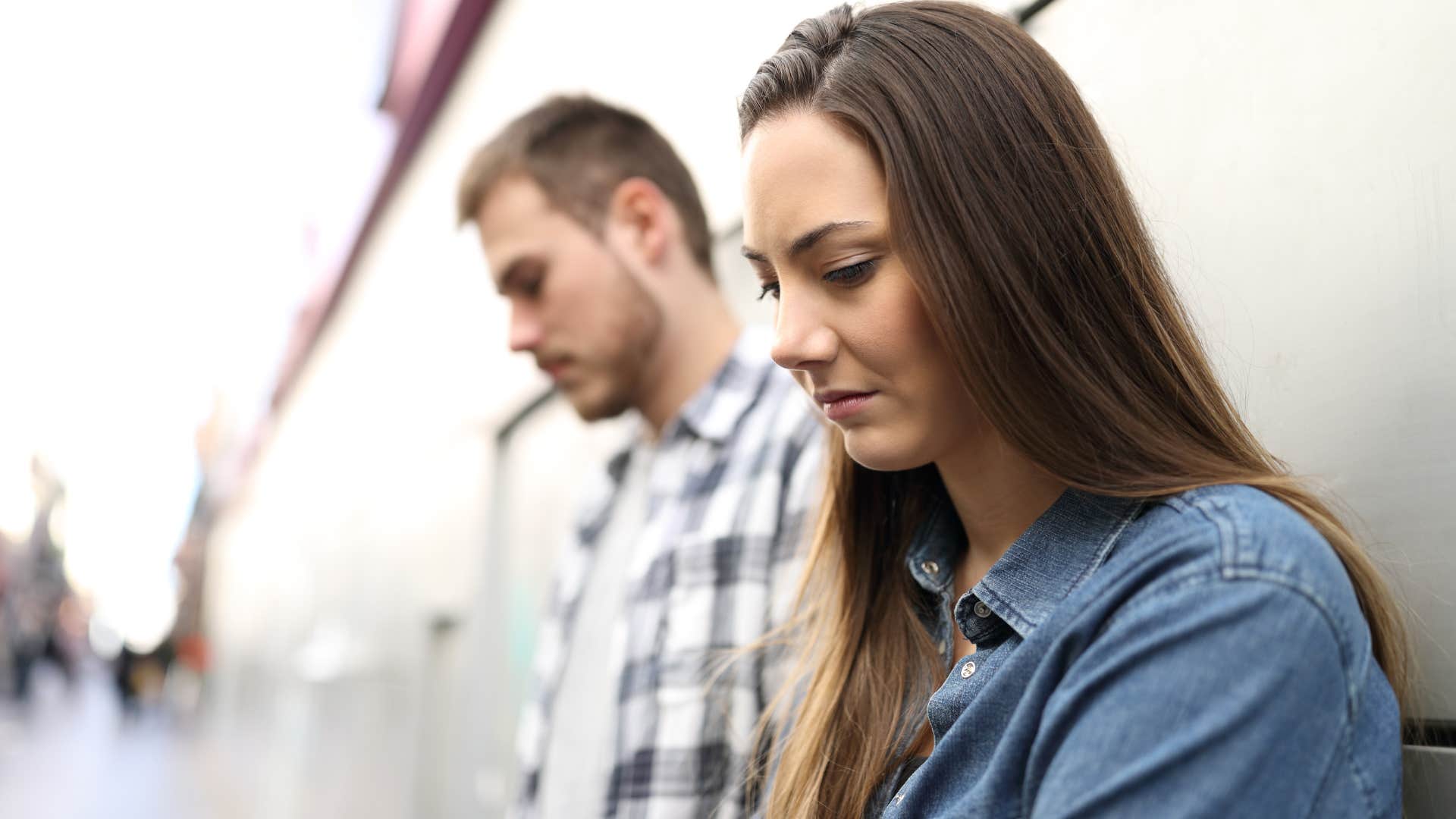 Woman who's not showing affection in public with her husband.