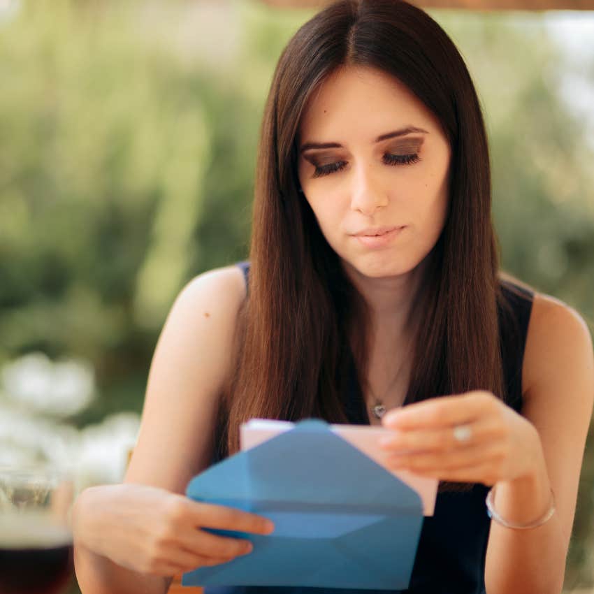 wife opening invitation to wedding she wasn't invited to husband's attending 