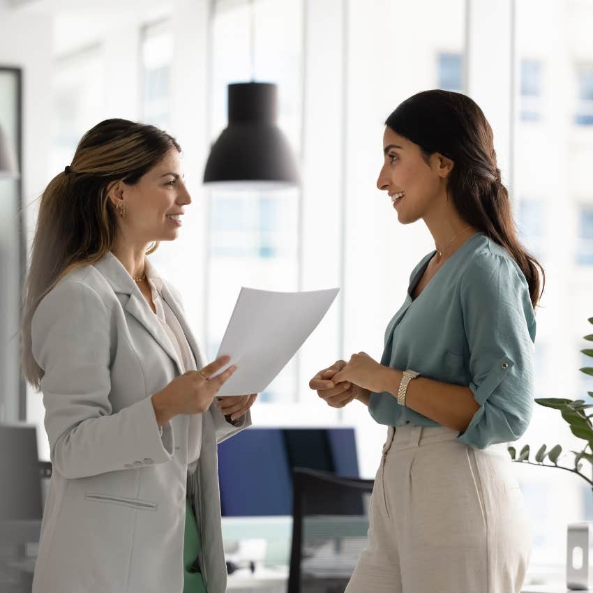 Worker talking to boss about increase in pay CEO says workers lose respect for bosses who won't be transparent