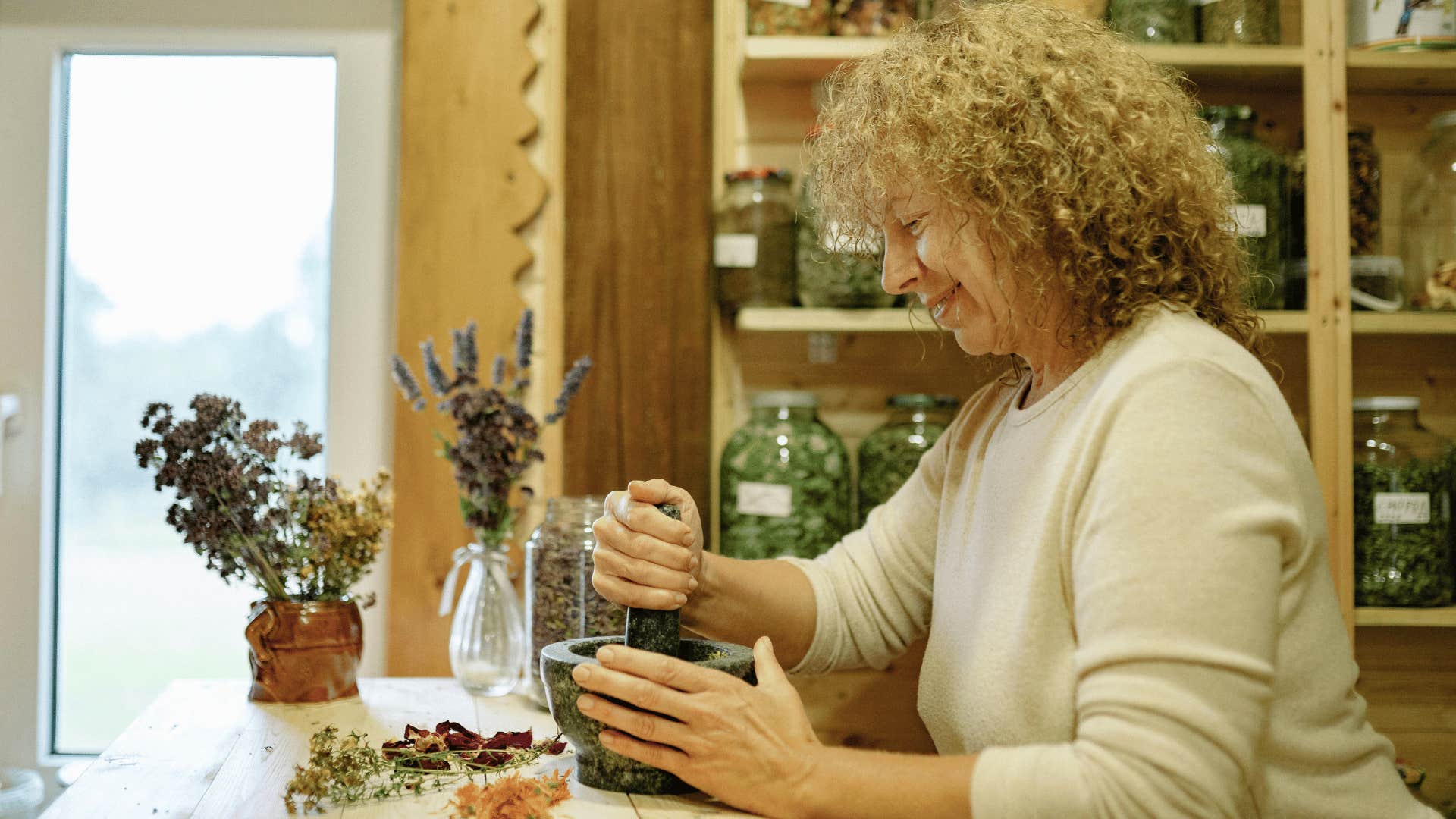 woman comfortable with herbalism quietly building mental toughness