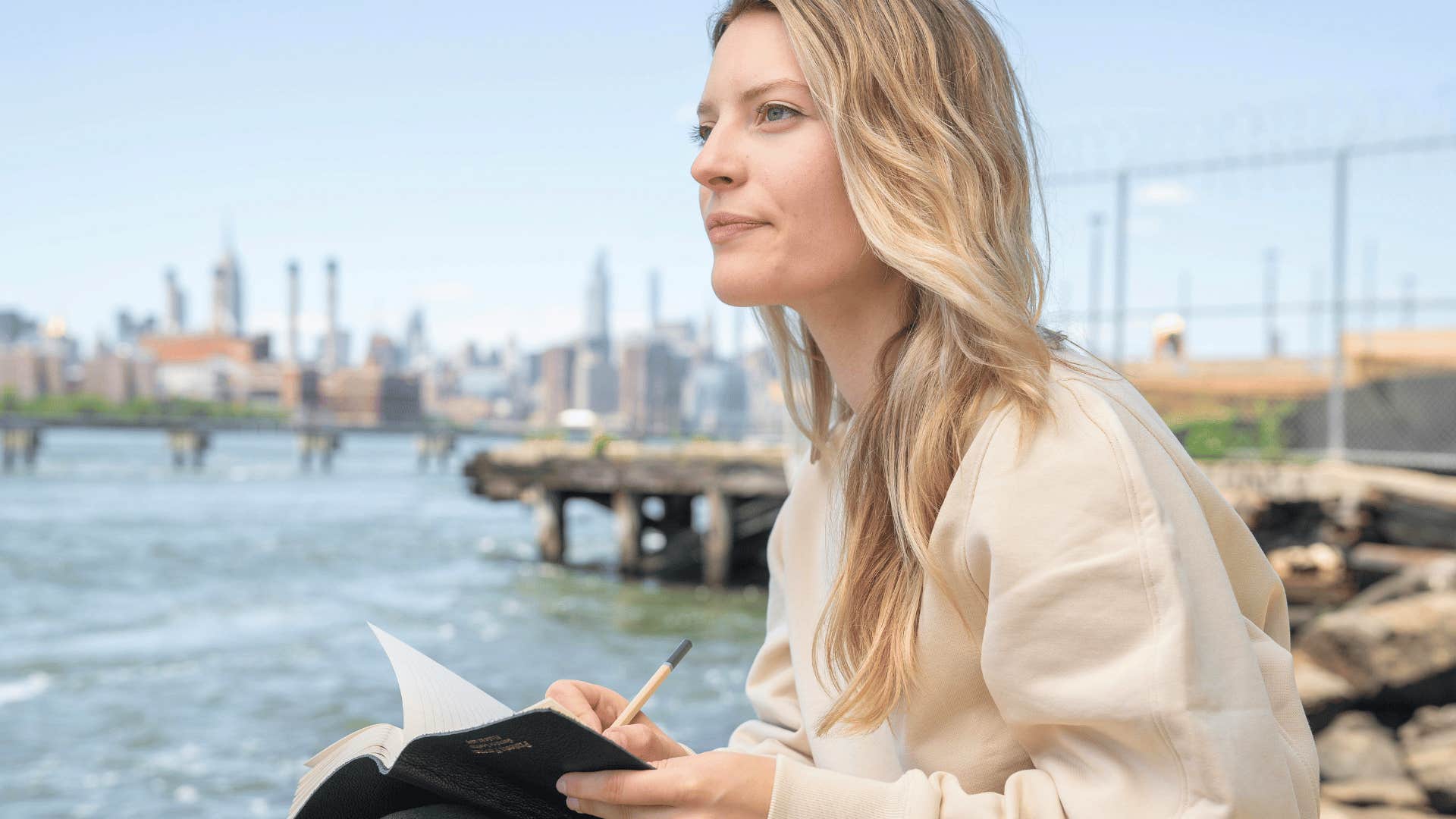 woman recording outdoor experiences quietly building mental toughness