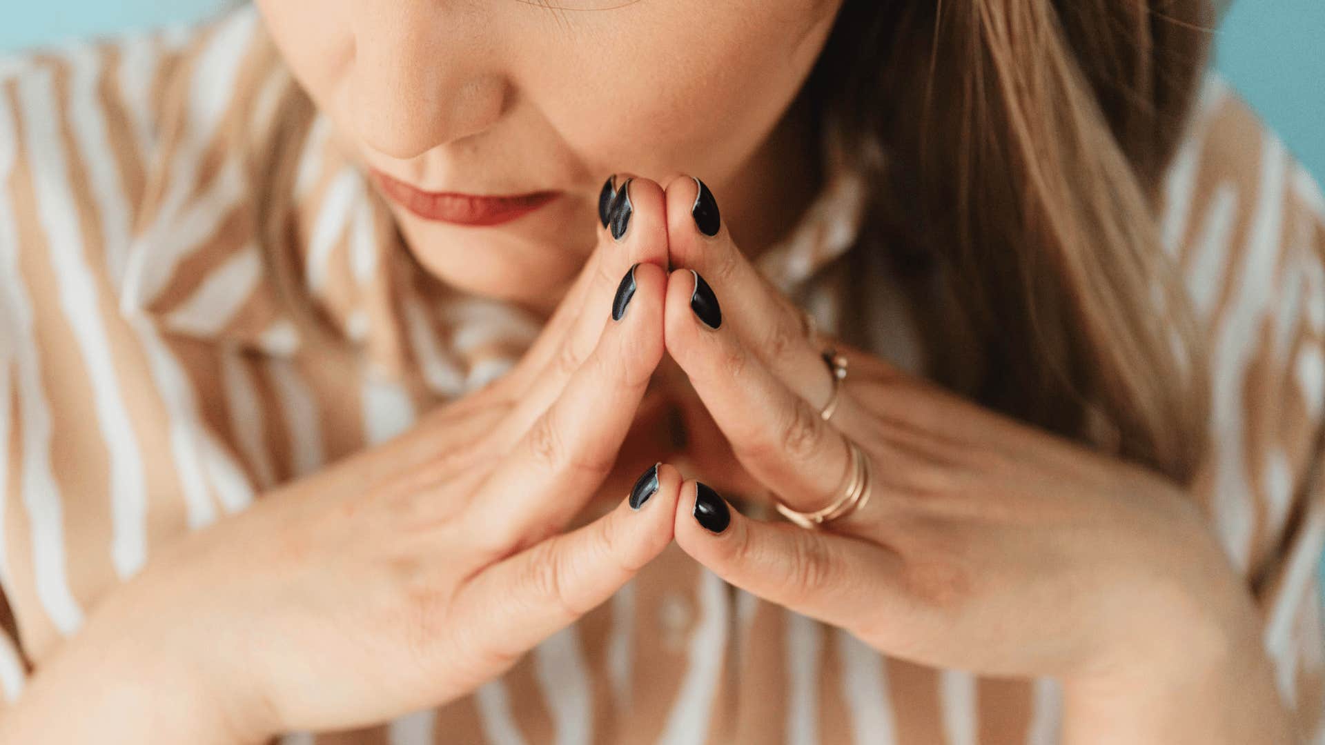 woman referring to panic cue card to keep from spiraling